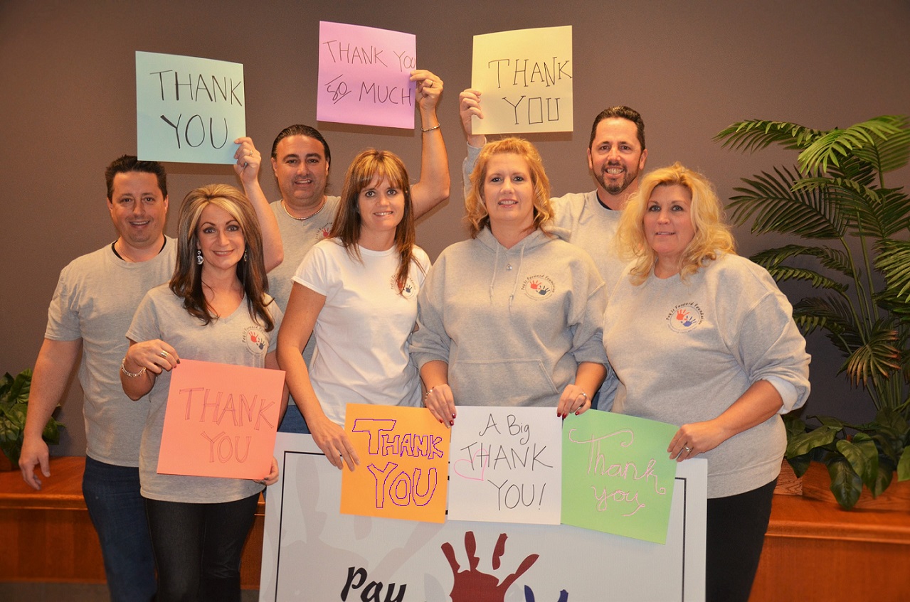 Pay It Forward Foundation board members saying thank you to supporters